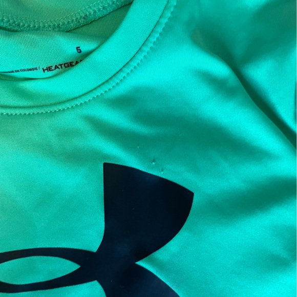 Green Under Armour shirt. Boys size 5. Played in but life left. - Picture 2 of 3